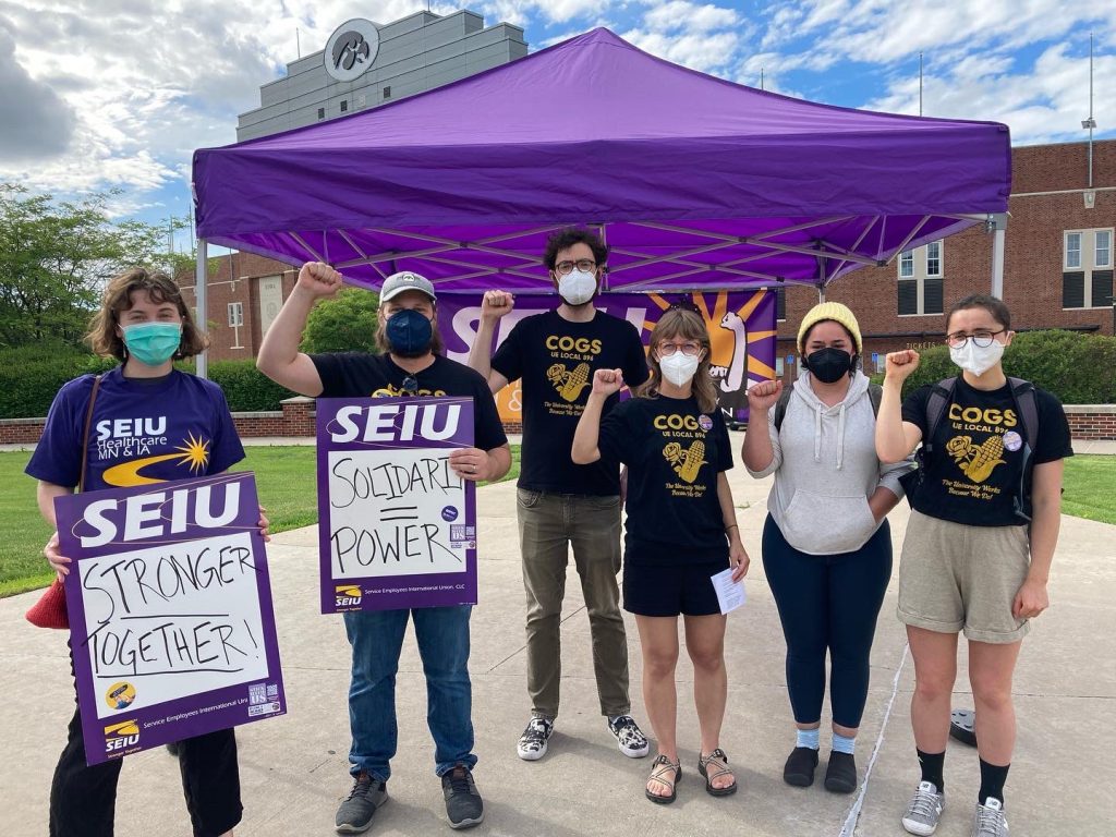COGS members stand in solidarity with SEIU, the nurses' union.